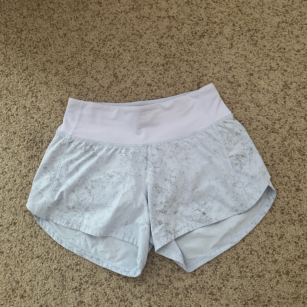 Lululemon Speed Up
Mid- Rise Lined
Short 4" Pastel Blue Marble in size 2